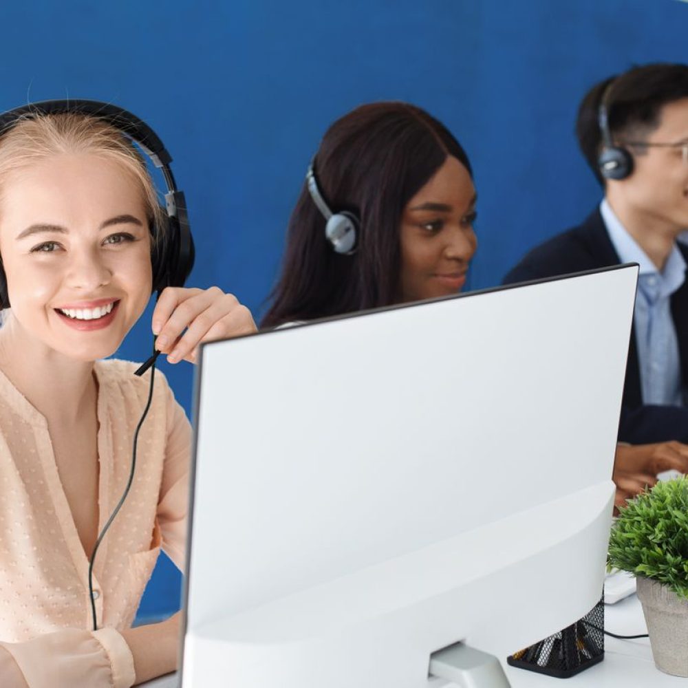 joyful-customer-service-agents-with-headphones-com-2021-08-28-11-02-41-utc
